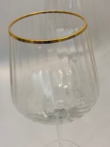Close up of Gold Rim Art Deco Style Wine Glasses 